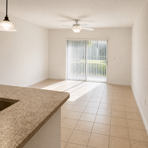 Homestead apartment for rent - A kitchen with a counter and a ceiling fan.