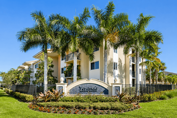 Homestead apartment for rent - A large white building with a sign that says "Venetian" in front of it.