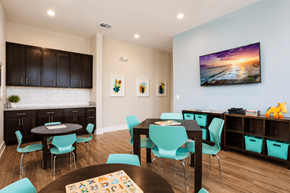 Spring Hill apartment for rent - A dining room with a large table surrounded by chairs.