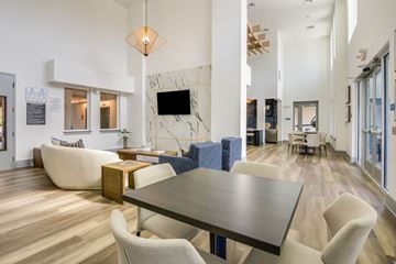 Crystal River apartment for rent - A modern living room with a large table and chairs.