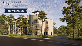 Orlando apartment for rent - A building with the sign "Grand East Village" is now leasing.