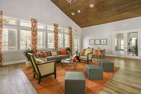 Brooksville apartment for rent - A living room with a couch, chairs, and a coffee table.