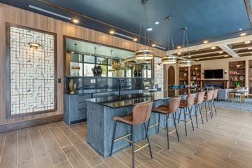 Palmetto Bay apartment for rent - A modern kitchen with a bar area and seating.