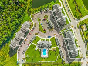 Palm Coast apartment for rent - arial view of a campus with a swimming pool