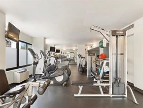 Hackensack apartment for rent - Steppers, treadmills, and weight machines inside the Prospect Place fitness center  at Prospect Place, New Jersey