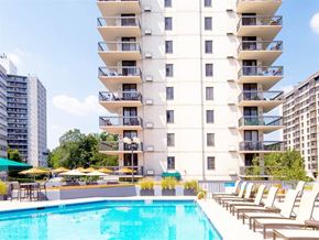 Hackensack apartment for rent - Luxury, resort-style pool with poolside chairs at Prospect Place, NJ 07601