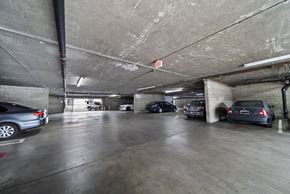 Wilmington apartment for rent - A parking garage with several cars parked in it.