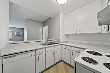 Van Nuys apartment for rent - A white kitchen with a stove top oven.