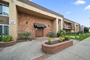 Van Nuys apartment for rent - A brick building with a black awning that says "Barnes & Noble.".