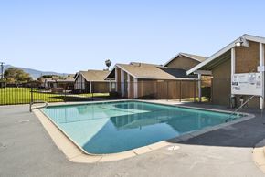 Hemet apartment for rent - A swimming pool in a residential area.