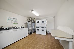 Palmdale apartment for rent - A laundry room with a washer and dryer.
