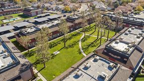 Lancaster apartment for rent - A bird's eye view of a residential area with houses and trees.
