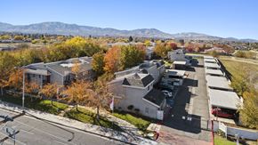 Palmdale apartment for rent - A view of a residential area with houses and trees.