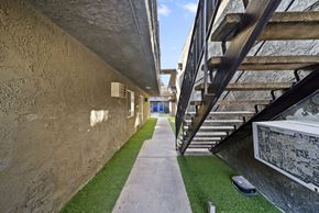 North Hills apartment for rent - A stone wall with a staircase on the right side.