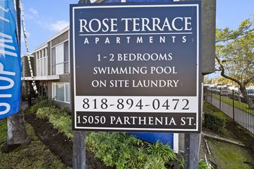 North Hills apartment for rent - A sign for Rose Terrace Apartments with a swimming pool on site.