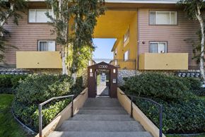 Pacoima apartment for rent - A building with the number 12300 on it.
