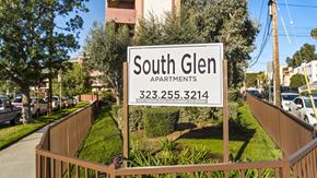 Los Angeles apartment for rent - A sign for South Glen Apartments is displayed in front of a fence.
