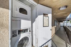 Los Angeles apartment for rent - A washing machine is installed in a small room.