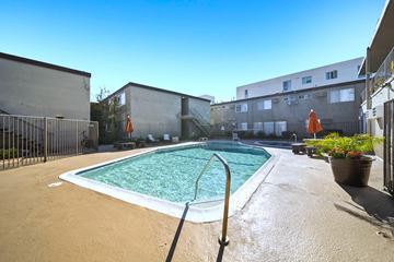 Panorama City apartment for rent - A small pool with a metal fence around it.