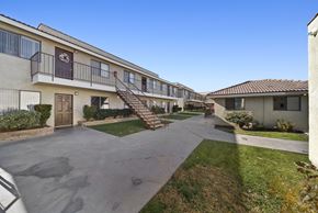 Palmdale apartment for rent - A sunny day at the courtyard of a residential building.