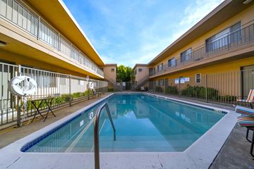 Reseda apartment for rent - A small pool in a courtyard surrounded by buildings.
