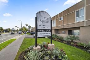 Panorama City apartment for rent - A sign for apartment homes with a phone number and address.