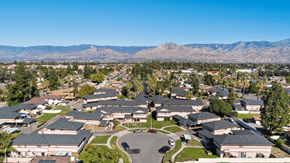 Redlands apartment for rent - A large, well-maintained residential area with houses and a clear sky.