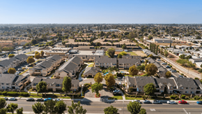 Rialto apartment for rent - A suburban neighborhood with houses and parked cars.