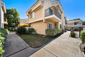 Fontana apartment for rent - A residential area with a house and a driveway.