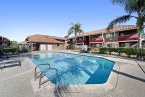Fontana apartment for rent - A swimming pool in a sunny outdoor setting.