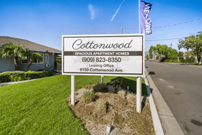 Fontana apartment for rent - A sign for Cottonwood Spacious Apartment Homes with a leasing office at 8150 Cottonwood Ave.