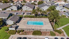 Fontana apartment for rent - Drone view of Cotton Wood Apartment's hot tub and pool.