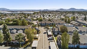 Rialto apartment for rent - A residential area with houses and trees.