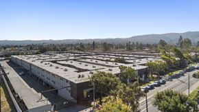 Rowland Heights apartment for rent - A parking lot with a building in the background.