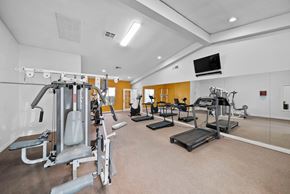 Las Vegas apartment for rent - A well-equipped gym with various exercise machines.