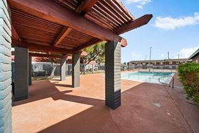Las Vegas apartment for rent - A patio with a pool in the background.
