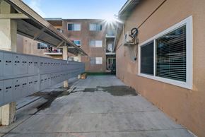 Hawthorne apartment for rent - A sunny day at a residential area with apartment buildings and a clear sky.