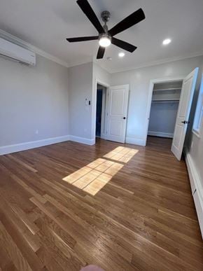 Wellesley apartment for rent - A room with a ceiling fan and wooden flooring.