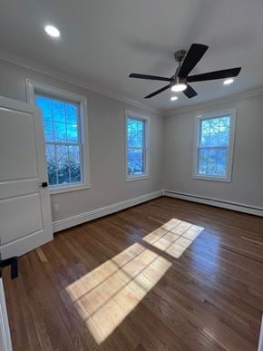 Wellesley apartment for rent - A room with a ceiling fan and two windows.