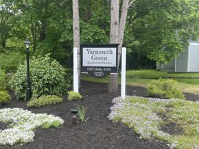 Yarmouth apartment for rent - a yard with a sign for yarmouth green apartment homes