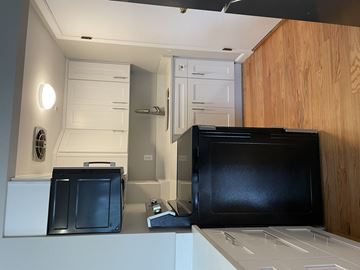 Andover apartment for rent - a kitchen with a microwave and a refrigerator