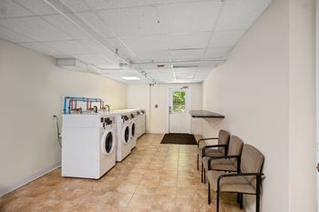 Taymil 125 charles apartment homes laundry facility