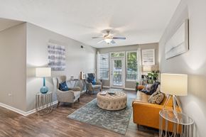 Canton apartment for rent - A living room with a sofa, chairs, and a rug at The Atlantic Canton Ridge, Georgia