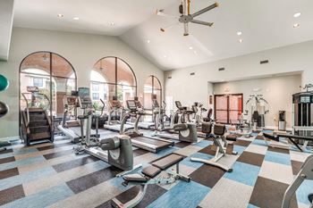 Spacious fitness center with treadmills and elliptical machines