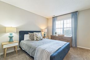 Charlotte apartment for rent - a bedroom with a bed and a window at Magnolia Terrace Apartments, Charlotte