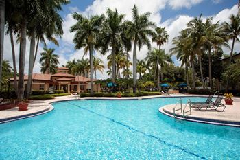 Expansive resort-inspired pool with sundeck and heated spa