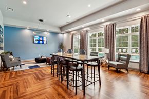 Charlotte apartment for rent - Dining room with a table and chairs in front of a window at The Atlantic Mountain Island, Charlotte, 28216