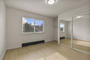 Berkeley apartment for rent - A room with a window and a mirror on the wall.