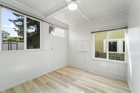 Berkeley apartment for rent - A room with a window and a wooden floor.