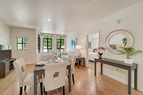 Berkeley apartment for rent - A dining room with a table set for six.